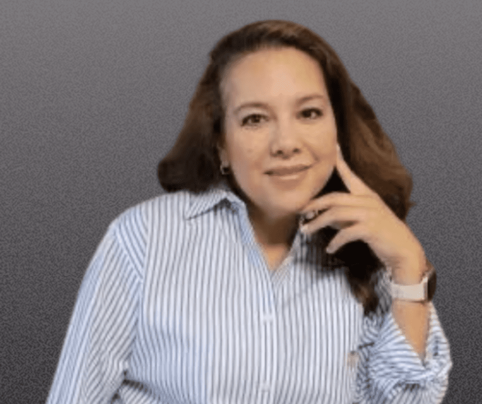 Woman in striped shirt smiles at camera.